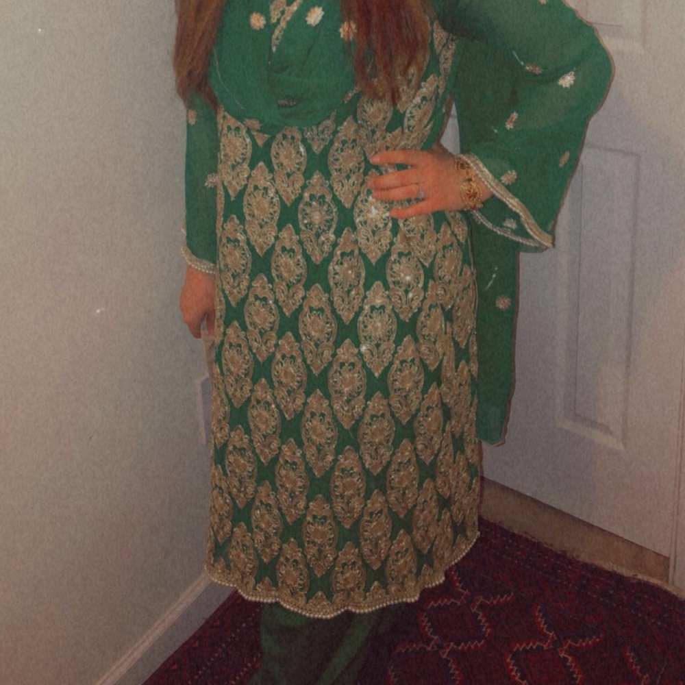 Green Pakistani suit with bead detailing